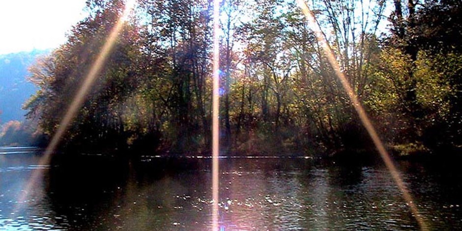 Sunburst Over River